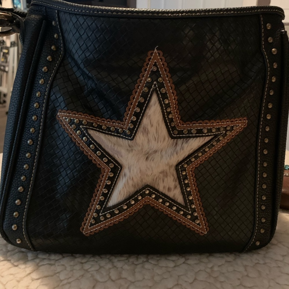 Leather and cowhide shoulder bag